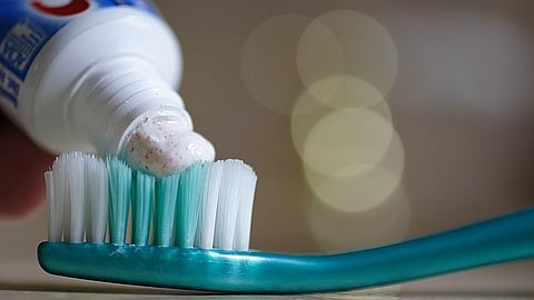 Fluoride in the toothpaste makes the teeth resistant to cavity-forming acids. (Wikimedia Commons)