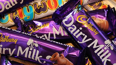 Assorted chocolates including Dairy Milk and Cadbury bars displayed together.