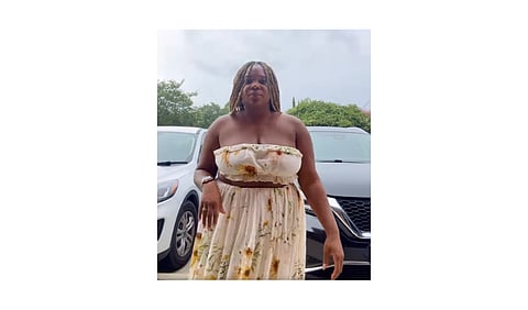 In a Facebook post, a nurse from Louisiana revealed that a steakhouse kicked her out for wearing "too revealing". (Screenshot from Y'Mine McClanahan's Facebook post)