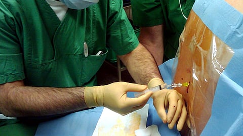 A new lease on life: A 52-year-old woman walks again after undergoing a complex 14-hour spinal surgery at Kimshealth Hospital. (Wikimedia Commons)