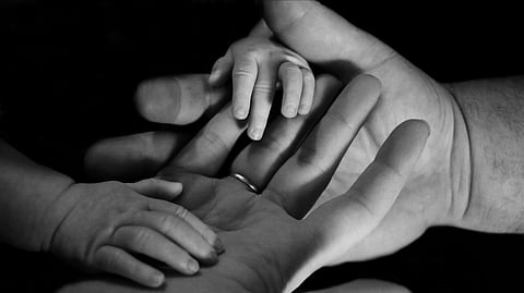Hands of a family