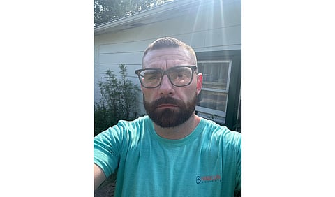After Tom Burke was seriously injured in a 2019 car crash, he was left with more than $10,000 in medical bills. The injuries— and resulting damage to his credit score— threw his family into turmoil. (Tom Burke - KFF Health News)