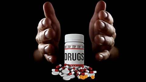 A pill box indicating "Stop drug" with capsules and tablets