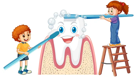 Brush like a boss—plaque is not invited to this smile party! (Image from Freepik)