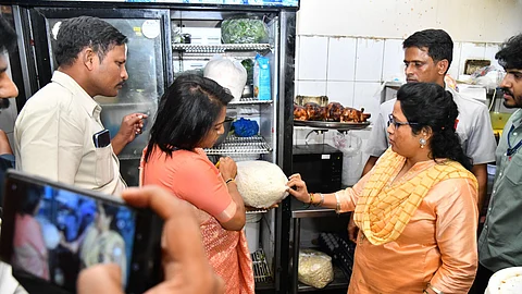A recent inspection of two local restaurants revealed a potentially hazardous food handling practice: storing cooked food in refrigerators and reheating it before serving. (Image Credits: X Source/gadwalvijayainc)