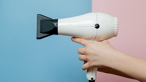 A Tragic Moment: The Aftermath of a Hair Dryer Explosion in Karnataka. (Image: Freepik)