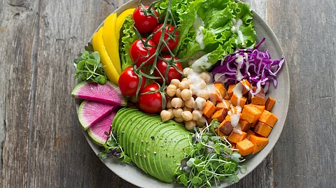 Start with a smaller helping and go back for more if you’re still hungry. Plan to fill half of your plate with fruits and veggies. (Unsplash)