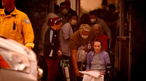 Patients are evacuated from the Brighton Care Center during the Eaton Fire in Pasadena, California, on Jan. 8.
