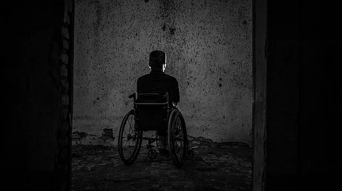 Man Sitting on Wheelchair