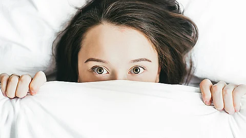Illustration of Sleep Apnea, showing disturbed sleep.