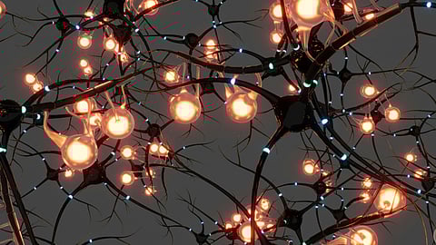 Digital representation of neurons with glowing synapses and dark branching structures indicating signal transmission.