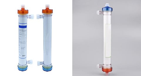 Two colorful tubes used in kidney dialysis, highlighting the importance of the dialyzer in the treatment process.
