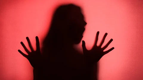 Terrifying hands silhouettes in the studio.