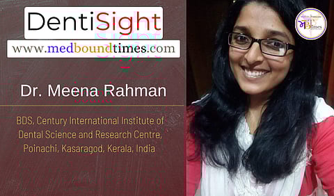 A picture of Dr. Meena Rahman smiling. She is wearing a red top and white shawl.