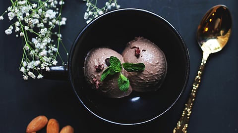Ice Cream on Bowl Beside Spoon