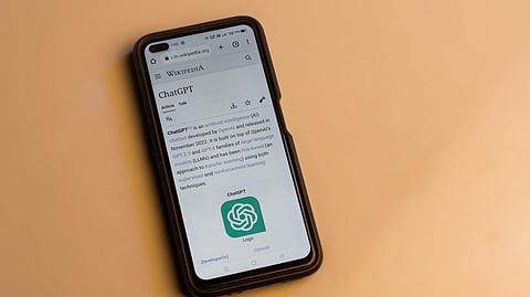 The webpage of ChatGPT, a prototype AI chatbot, is seen on the website of OpenAI, on a smartphone