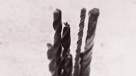 Top-view drilling bits