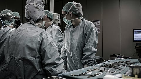 Team of doctors performing surgery