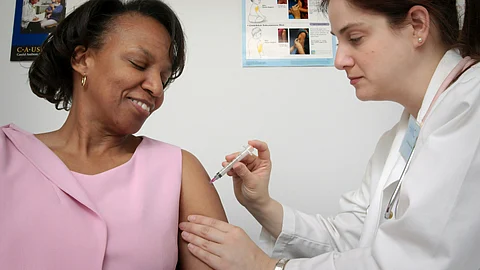 Adult getting vaccinated for a healthier future