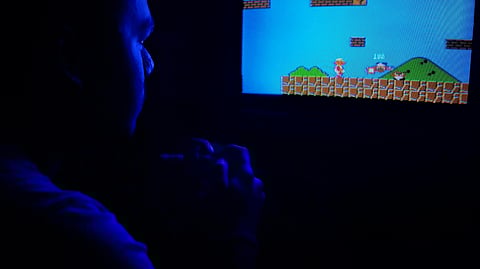 A man plays a video game