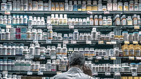 A man working as a pharmacist