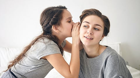 Picture of a young female having a curious, interested look