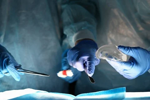 Surgeon with scalpel