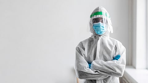 Man wearing protective suit