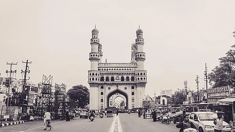 An image showing the historical monument of Charminar. It is a black and white image.