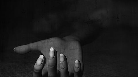 Blurred image of a female rape victim