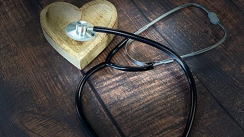 Stethoscope and a heart stencil