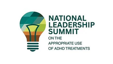 The logo of national leadership summit looking similar to a light bulb with multiple colors.
