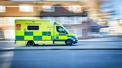 An emergency vehicle speeding to the site of emergency.