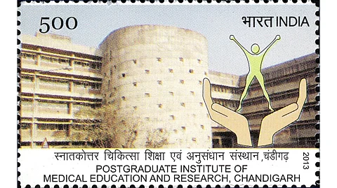 A stamp showing the building of PGIMER, Chandigarh.