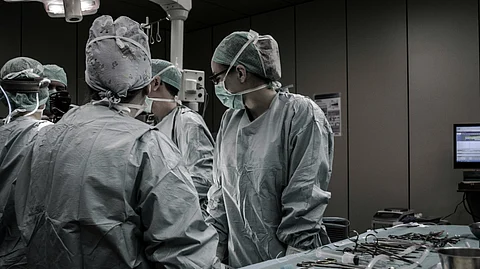 The image shows medical professionals working