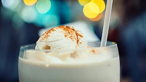 The image shows a glass of icecream.
