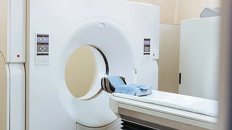Picture of an investigation room showing an MRI machine.