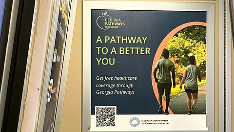 A public transit advertisement promoting the Georgia Medicaid Pathways program.