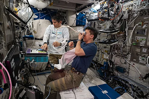 NASA astronaut Jonny Kim performs an eye ultrasound on the International Space Station.