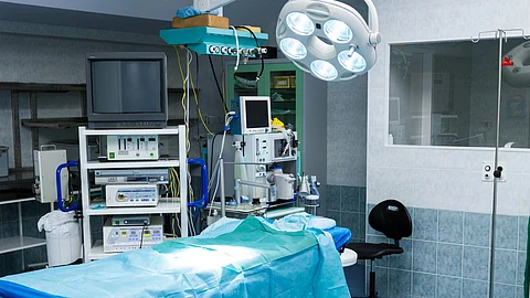 A sterile, empty operating theatre prepared for surgery.