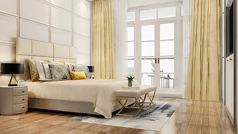 Image of a cozy bedroom having bed, pillows, mattresses, a side table having lamp, etc.
