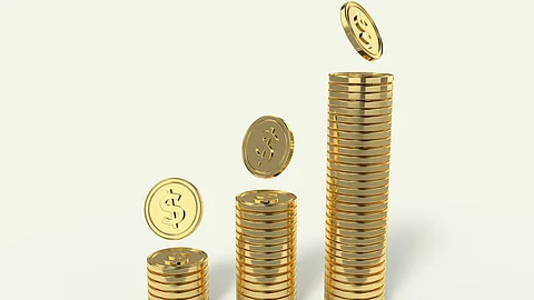 Image showing tower of gold coins in ascending order having white background.