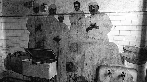 Picture depiction showing different doctors in an experimental/surgical room.