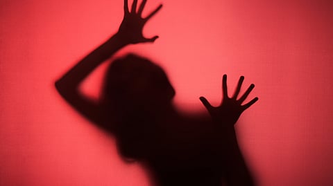 Image depicts a women in horrific situation