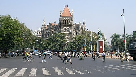 Mumbai residents commute the streets of central Mumbai.