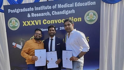 An image showing Dr.Gradlin posing with his certificate after completion of MCh CTVS.