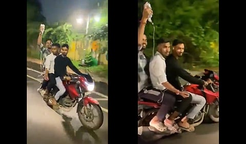 2 people riding bike with a patient on IV drip