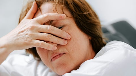 Image of an old woman depressed about her menopause symptoms.