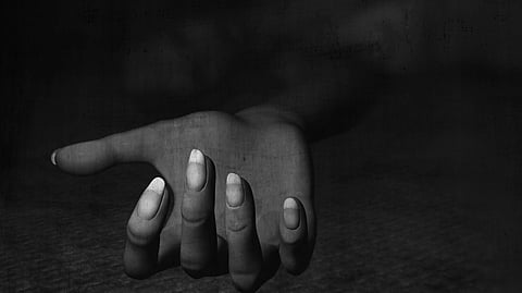Black and white image showing hands of a girl.
