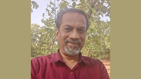Image of Sridhar Vembu, founder and CEO of Zoho Corporation in a maroon shirt.